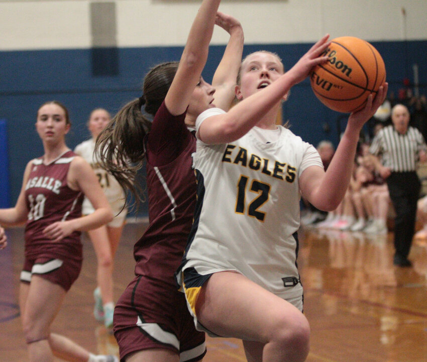 Maggie Ornstedt (right) and the Barrington High School girls basketball team will face Ponaganset in the Division I semifinals. The Eagles and Chieftains tip off on Friday night, Feb. 28, at 8 p.m. at Rhode Island College.