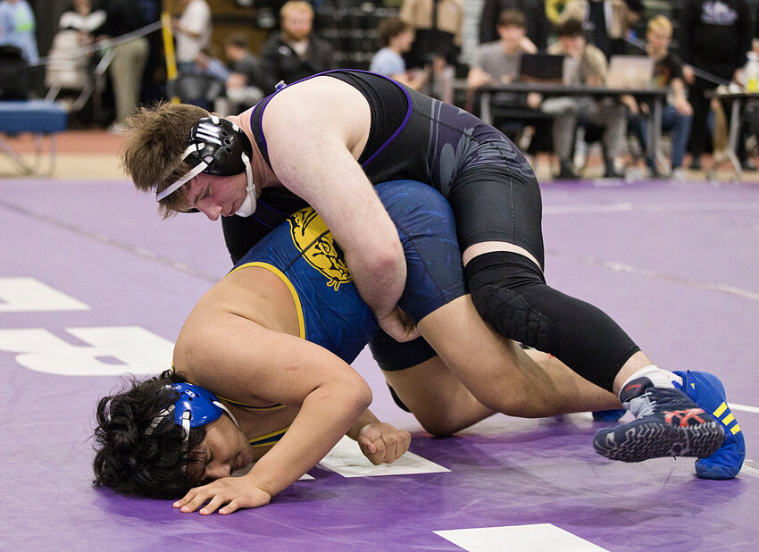 Colin Maloney wrestles for Mt. Hope High School at the 2025 Rhode Island State Championship Meet Saturday, March 1, in Providence.