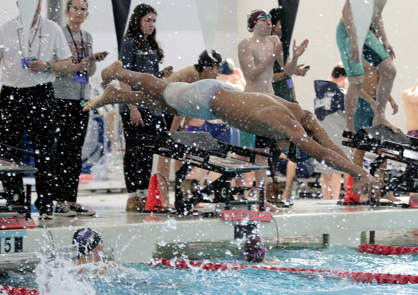 Finn Pansa dives into the pool for Mt. Hope High School during the boys' 200-yard freestyle relay at the 2025 state championships held Sunday, March 2, at Brown University in Providence. Pansa placed in two solo events for the Huskies.