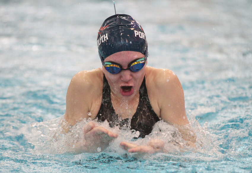 Mae Marston swims the breaststroke leg during the 200-yard medley relay at Sunday's state swim meet at Roger Williams University.