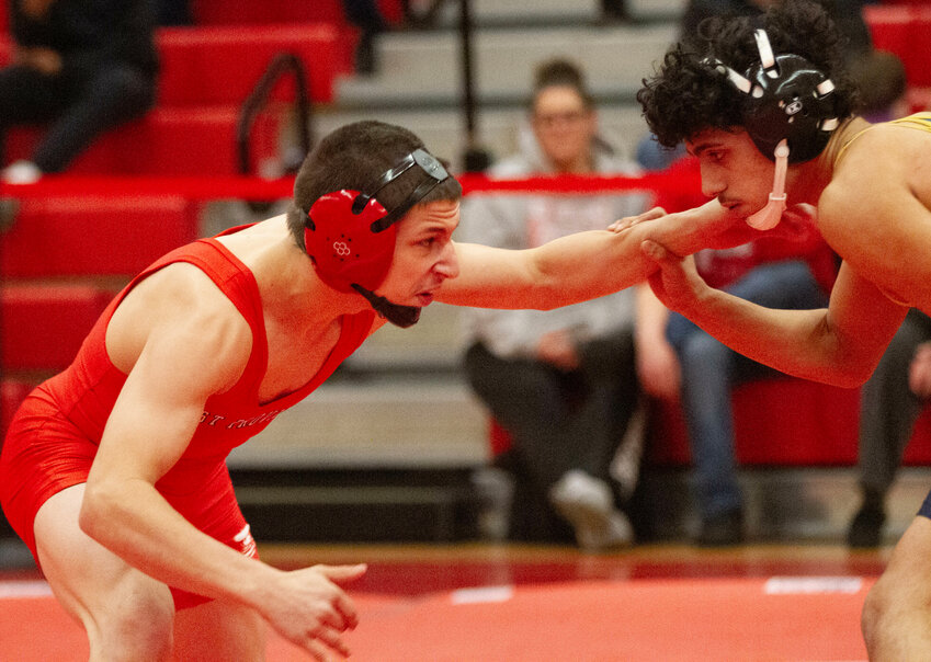 Charlie Phillips won the 138-pound state championship during the state tournament at the PCTA on Saturday night. Phillips is pictured here wrestling in a match at East Providence High School during the regular season.