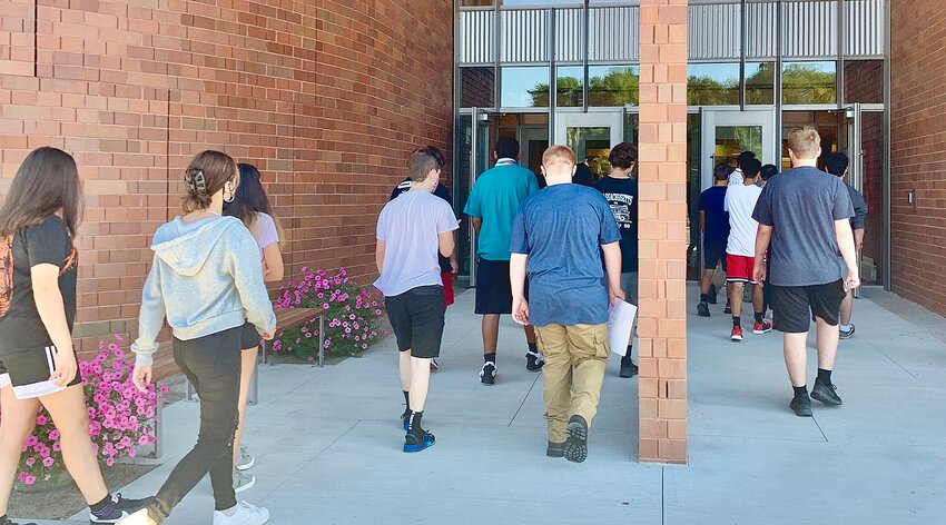 Westport students enter school for the first day of classes.
