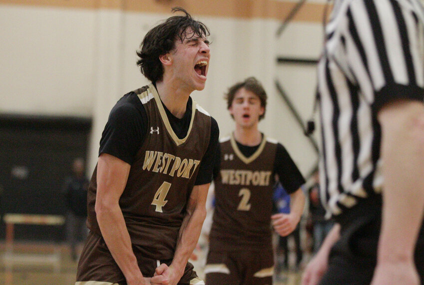Owen Boudria celebrates after giving Westport a slim lead in late the fourth quarter in Westport;s 57-56 loss to Hopedale in the D-5 Final Four.