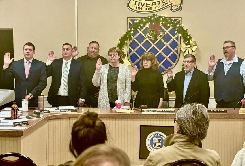 Blake Heyden (second from left) during the current council's swearing in in December, has resigned.