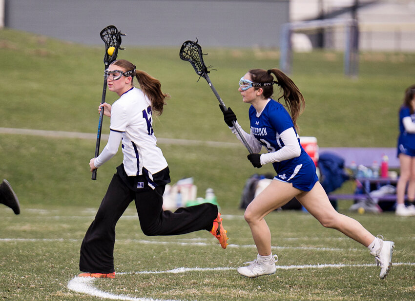Lola Silva (left) netted a hat-trick for the Mt. Hope High School girls' lacrosse team in its 2025 home debut against Middletown Wednesday, April 2, at the Naomi Street Field in Bristol.