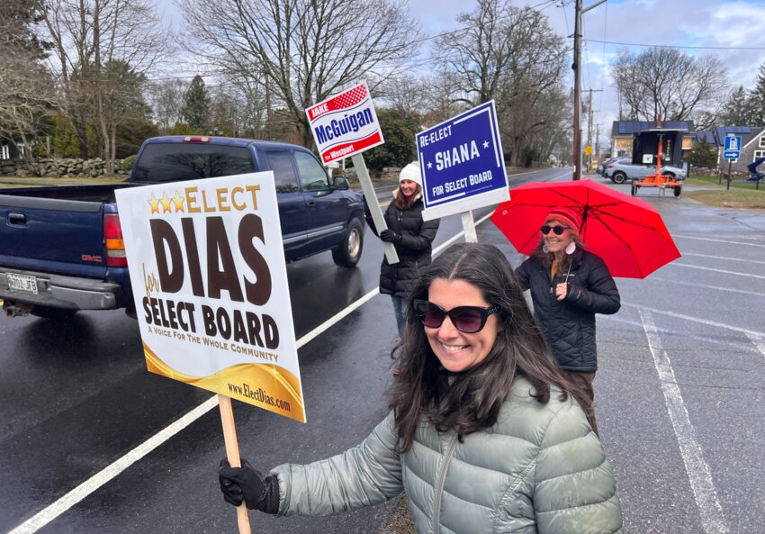 Canvassing for their preferred candidates Tuesday were Kim Fiola Gray (foreground), Linda Richter (middle) and Liz McGuigan (rear).