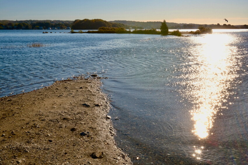 An extreme high tide in October 2024 completely flooded an access road at Gull Cove, off Route 24.