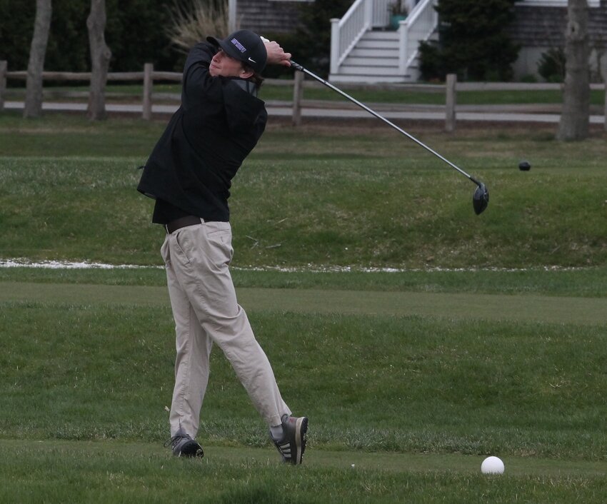 Ethan Martel tees off for the Mt. Hope High School golf team during the Huskies' 2025 season opener at Rhode Island Country Club against host Barrington and Rogers on April 21.