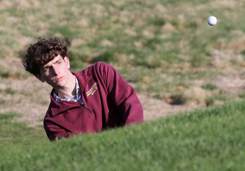 Caleb McConnell chips onto a green during a match at RI Country Club in Barrington, earlier this season.&nbsp;