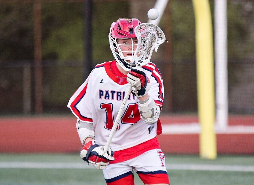 Portsmouth High's Oliver Melanson catches a pass during Friday&rsquo;s game against East Greenwich.
