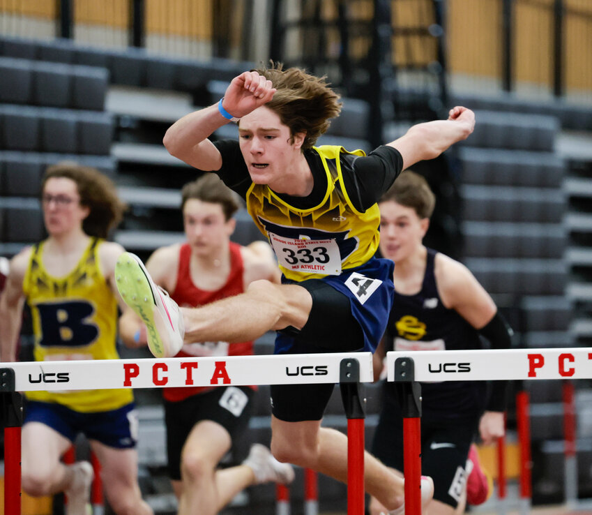 Barrington High School's Bobby Wind, shown at an indoor track meet, recently broke his own school record in the 110-meter hurdles while competing in the Track Night NYC meet at Ichan Stadium in New York City. He also tied the 2004 all-time Rhode Island State Record held by Hope High School&rsquo;s Pete Gbaa.&nbsp;