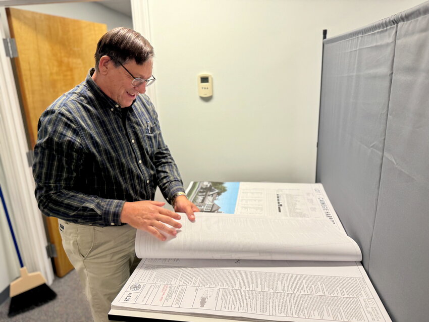 Portsmouth Building Official Matthew Kent, here reviewing plans for a new construction project, says there&rsquo;s still plenty of confusion over what home improvement or construction projects require building permits. &ldquo;There are a lot of people working without permits. And, it&rsquo;s basically because they don&rsquo;t know,&rdquo; he said.