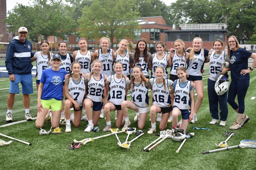 Pictured is the East Bay 7/8 Girls&rsquo; Lacrosse team: (back row) Coach Greg Blanco, Surry-Jane Manville, Molly Reagan, Mila Aguirre, Adelaide Crosby, Nina Hansen, Marisa Sao Bento, Ruby Sander, Daisy Moscrop, Kendall Blaney, Bridget Nolan, Coach Cerissa Blaney, (front row) Coach Jacqueline LoVerme, Avery Blanco, Maggie Porter, Lucy LoVerme,  Skyler LoVerme, Emma LoVerme, and Hadley Slusarz.