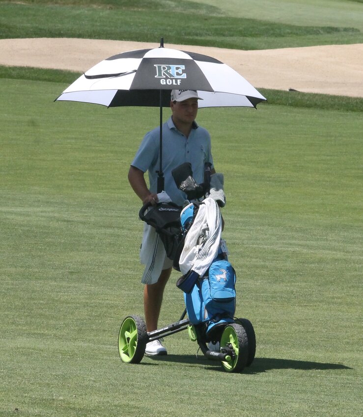 Umbrellas were seen all around Rhode Island Country Club Tuesday, June 23, as players in the 2025 State Amateur golf championship tried to stave off the triple-digit temps.