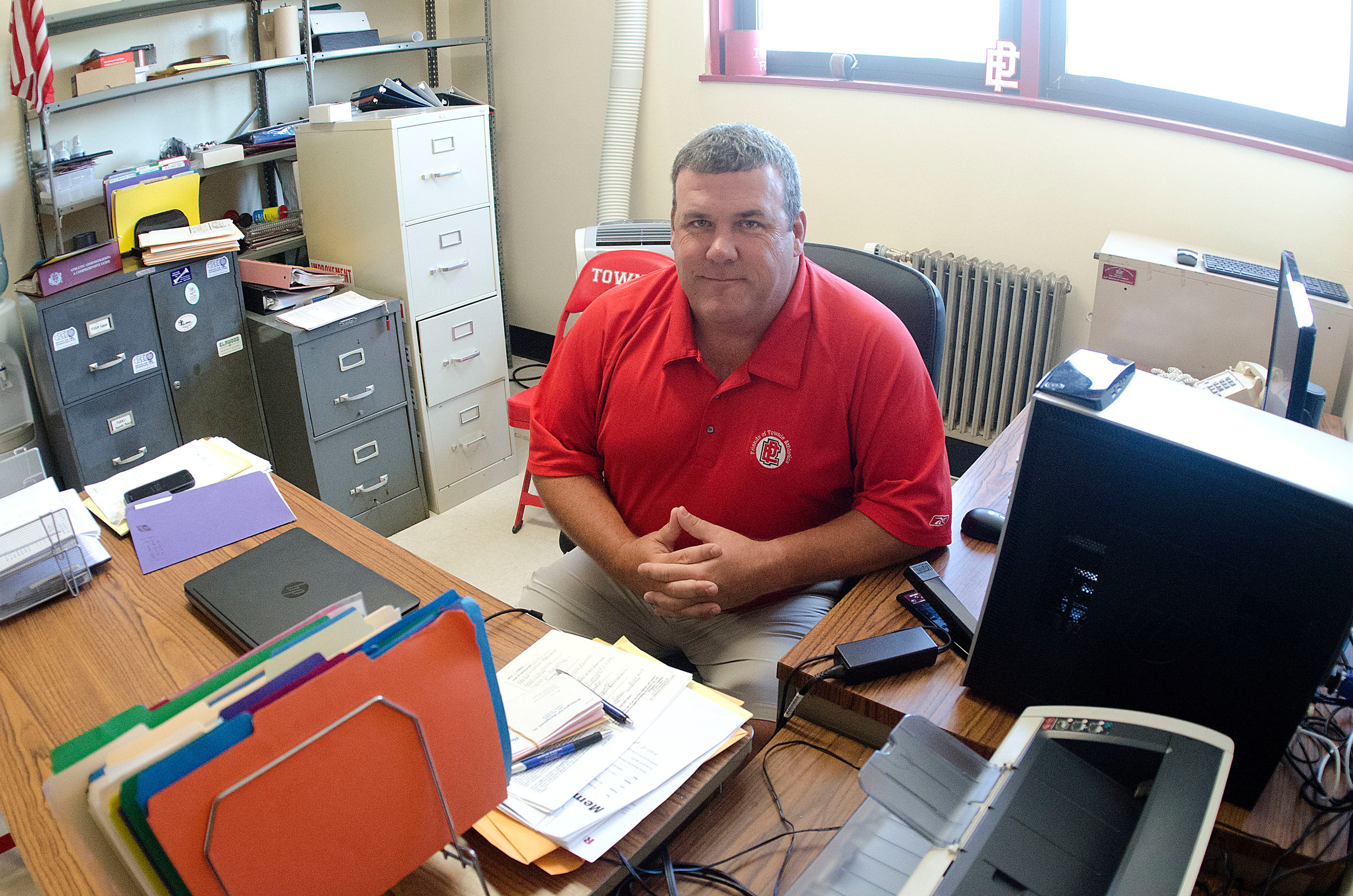 Mr. Amore started work in the athletic office last month.