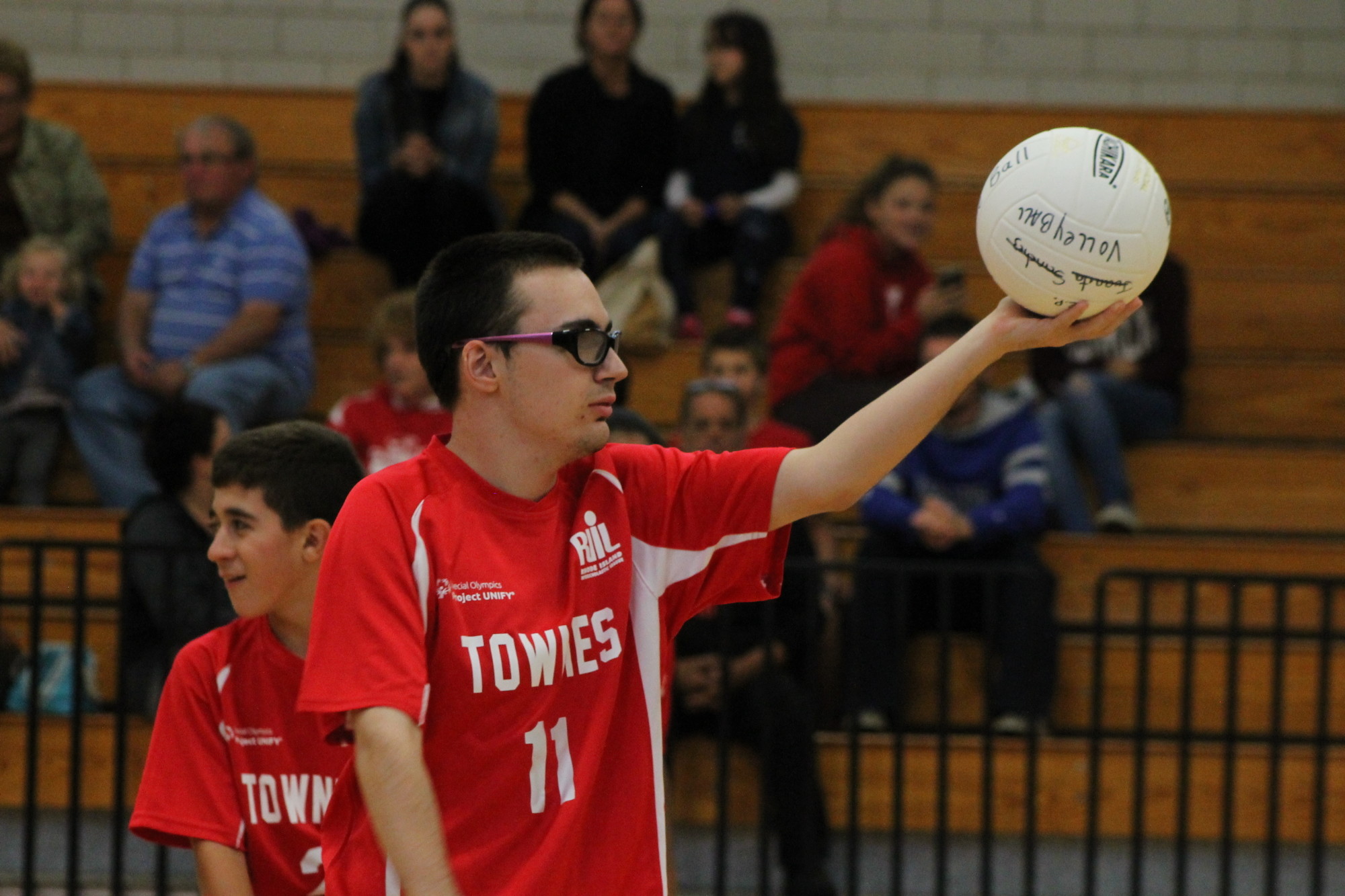 EPHS Unified Volleyball athlete Nicholas Lethbridge serves during a recent match.