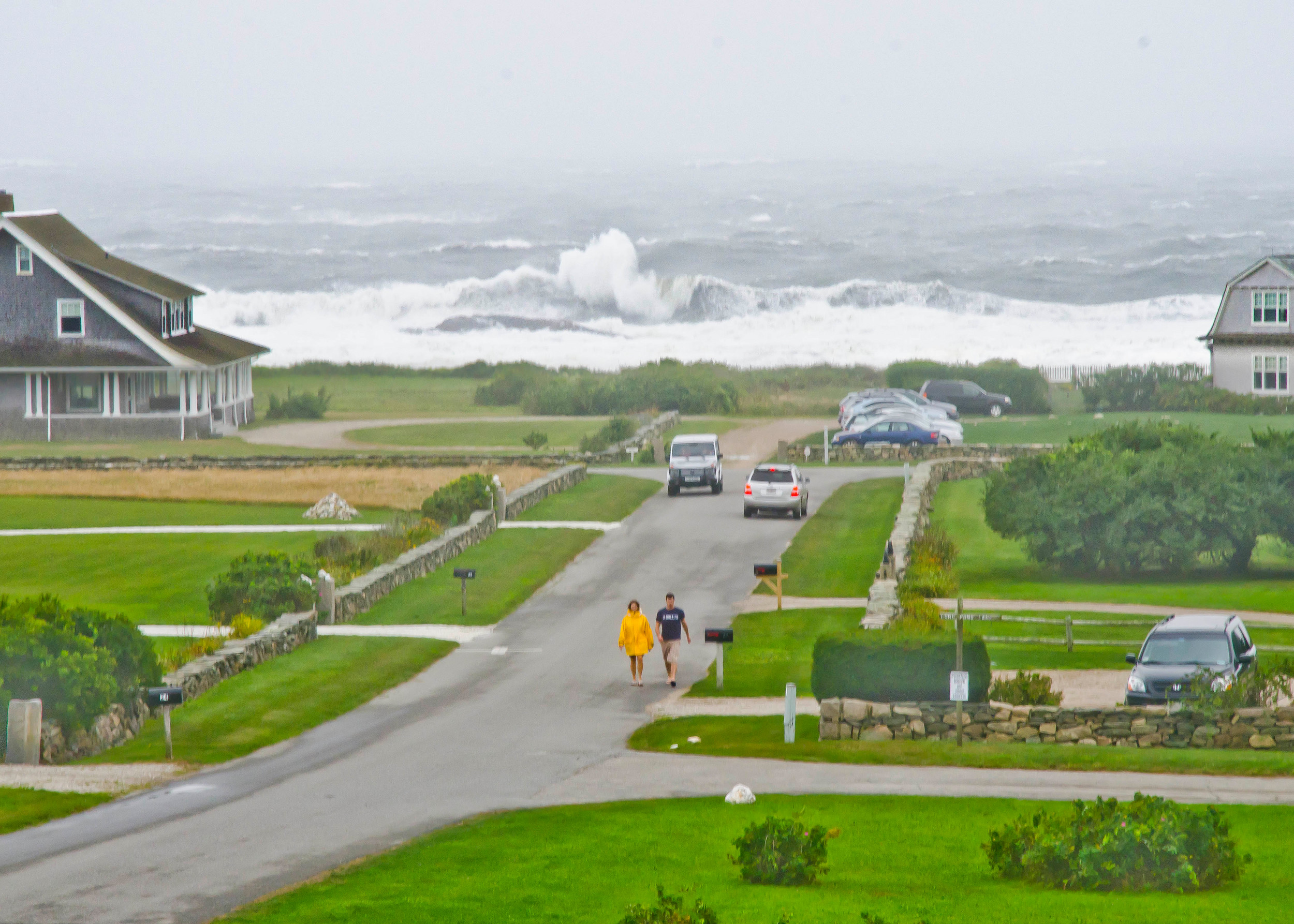 Tropical storm waves roll into Little Compton near Warren’s Point a few years ago.