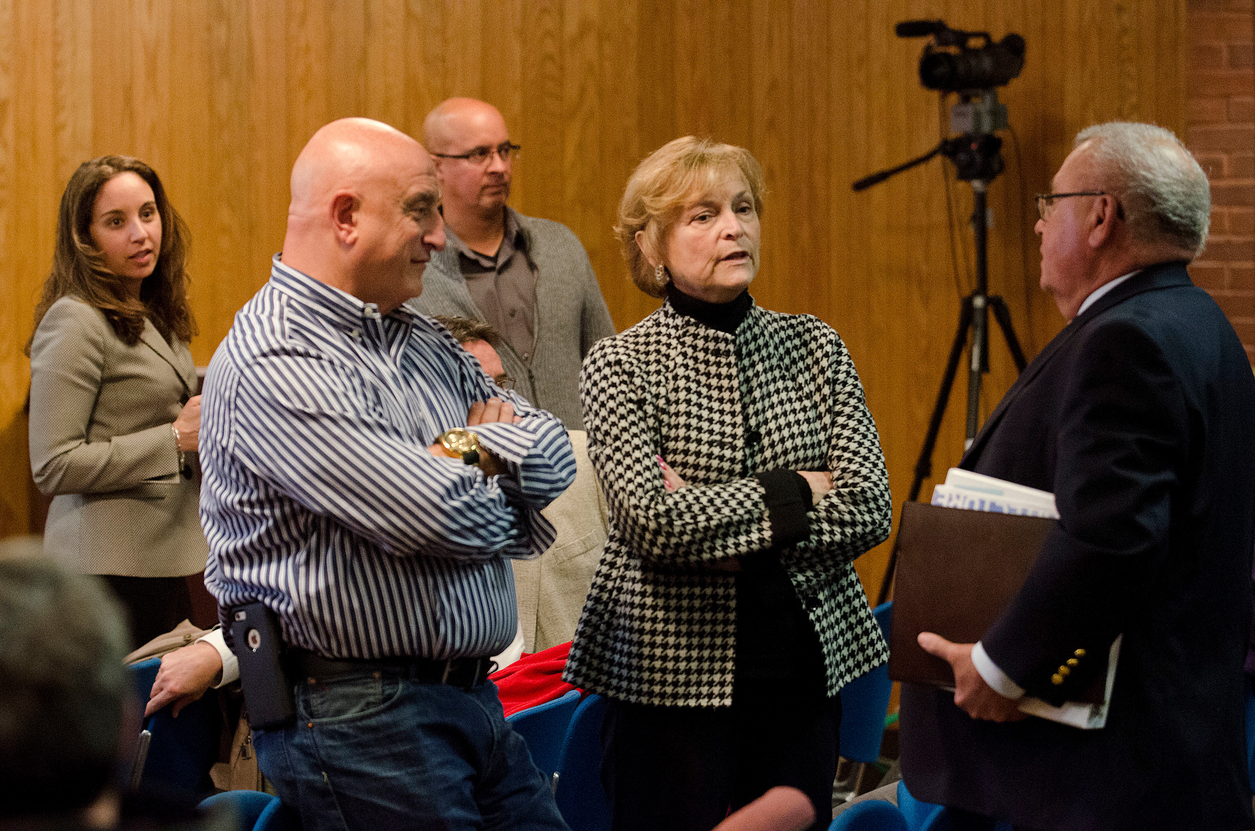 Facilities director Tony Feola, superintendent Kathryn Crowley and former superintendent Manny Vinhateiro have a discussion during the school committee's special session Monday.