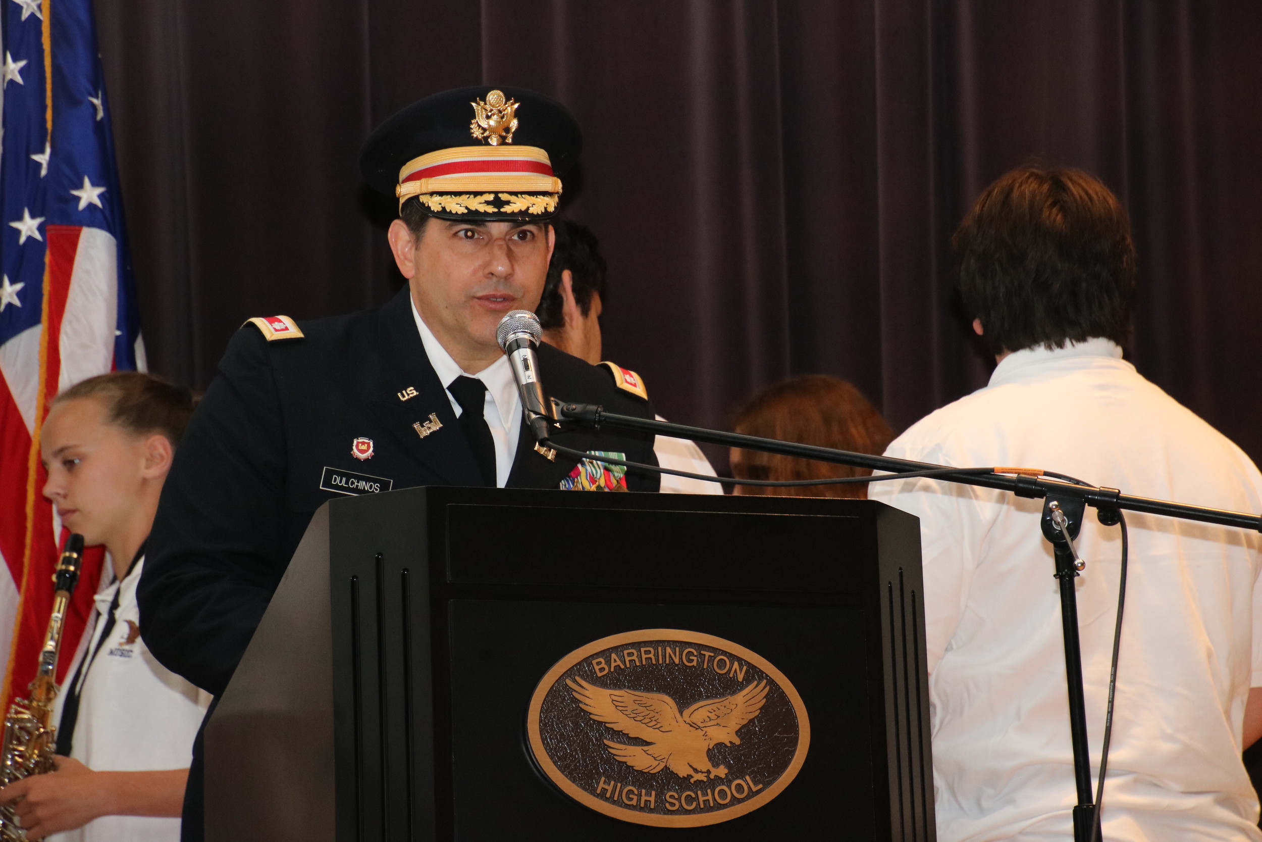 Retired Lt. Colonel Paul Dulchinos addresses the crowd inside Barrington High School on a previous Memorial Day.