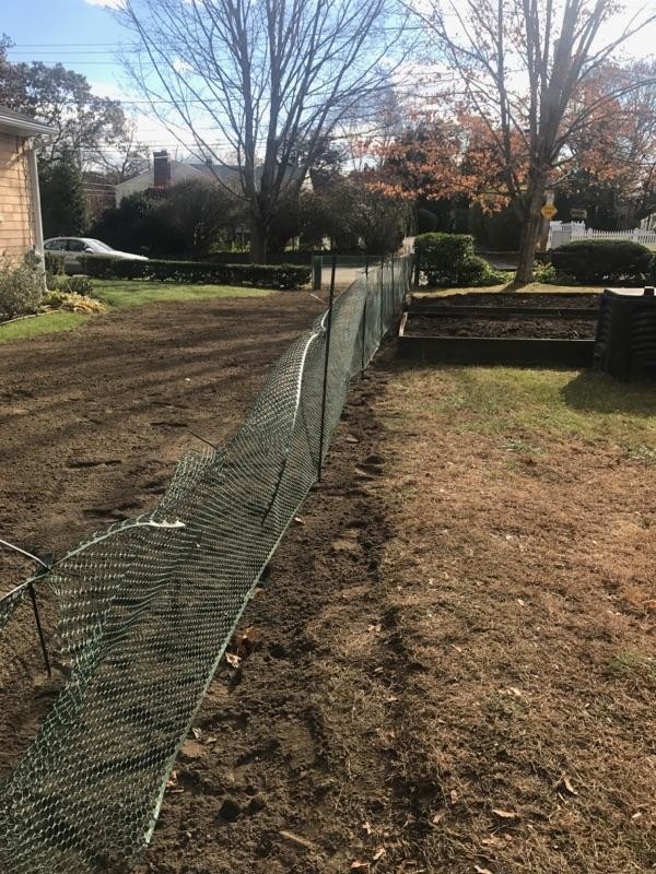 This view — looking toward Chachapacassett Road — shows a temporary fence surrounding the newly seeded yard belonging to Barb Masterson. A survey reportedly shows that a right-of-way actually crosses her neighbor's property.