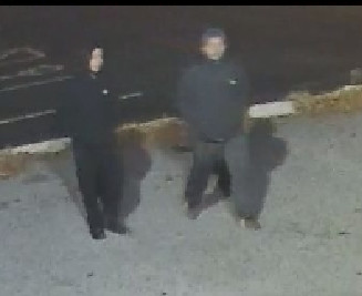 Two male suspects in the theft-stabbing at Town Wine & Spirits as captured by security cameras at the business Saturday evening, Dec. 2.