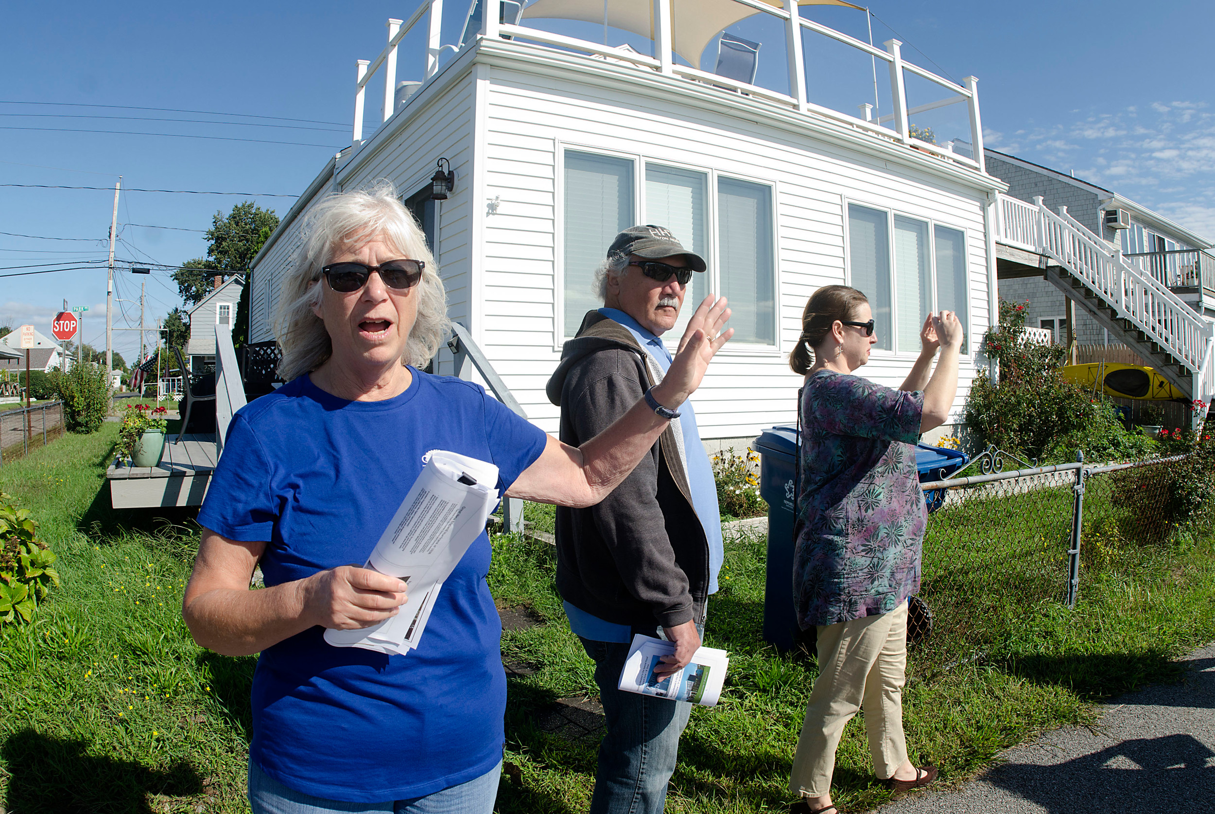 Janet Freedman (middle) of CRMC stands in front of a house on Fountain Avenue while talking about the 1938 Hurricane’s devastating impact.