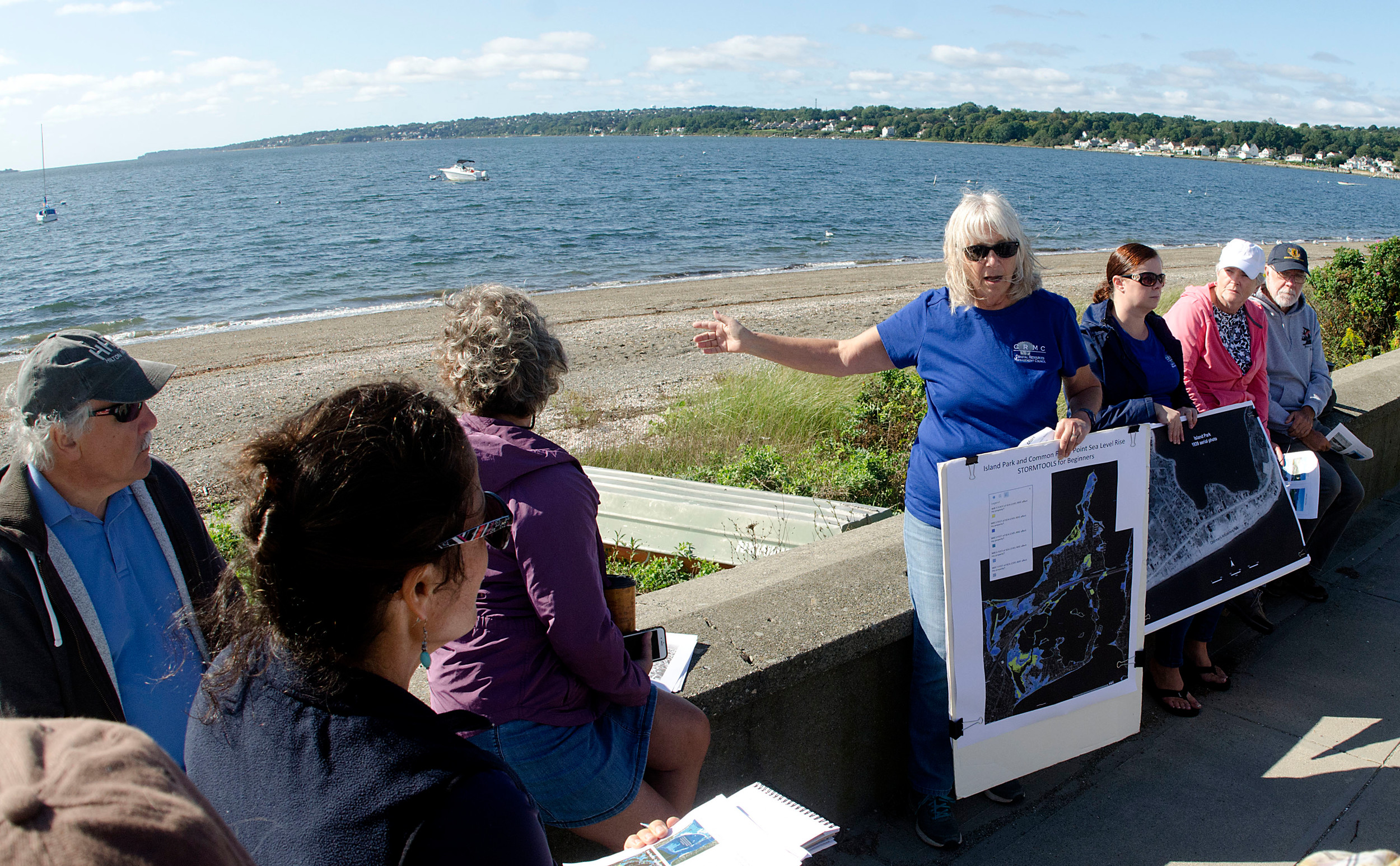 Janet Freedman (middle) and Laura Dywer (right) of CRMC speak about the 1938 Hurricane during an anniversary tour at Island Park on Friday morning.