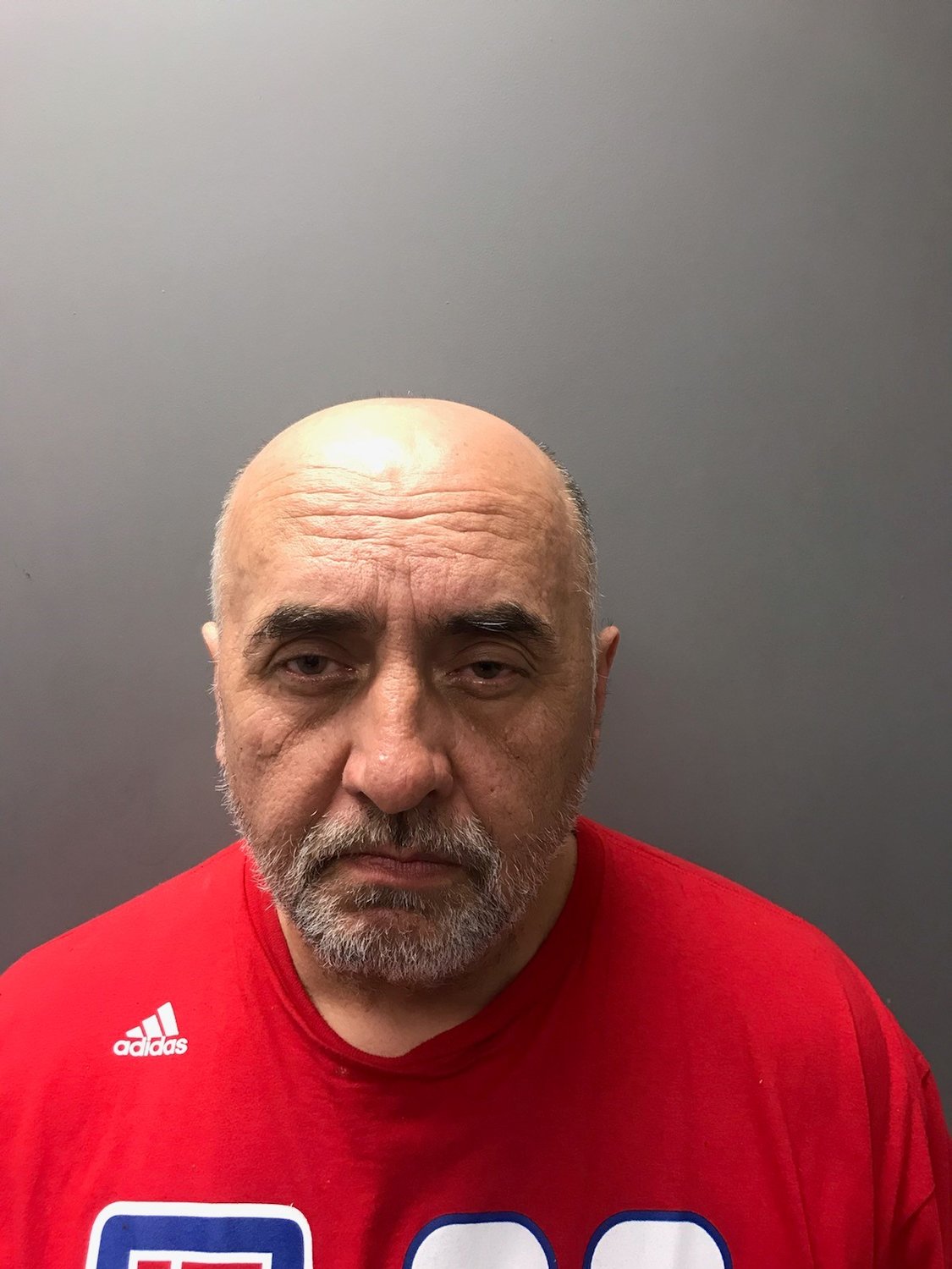 Lino A. Loyola of Middletown, as he appeared in his Portsmouth Police booking photo. He was arrested Tuesday and charged with breaking into 15 Point Road Restaurant in Island Park.