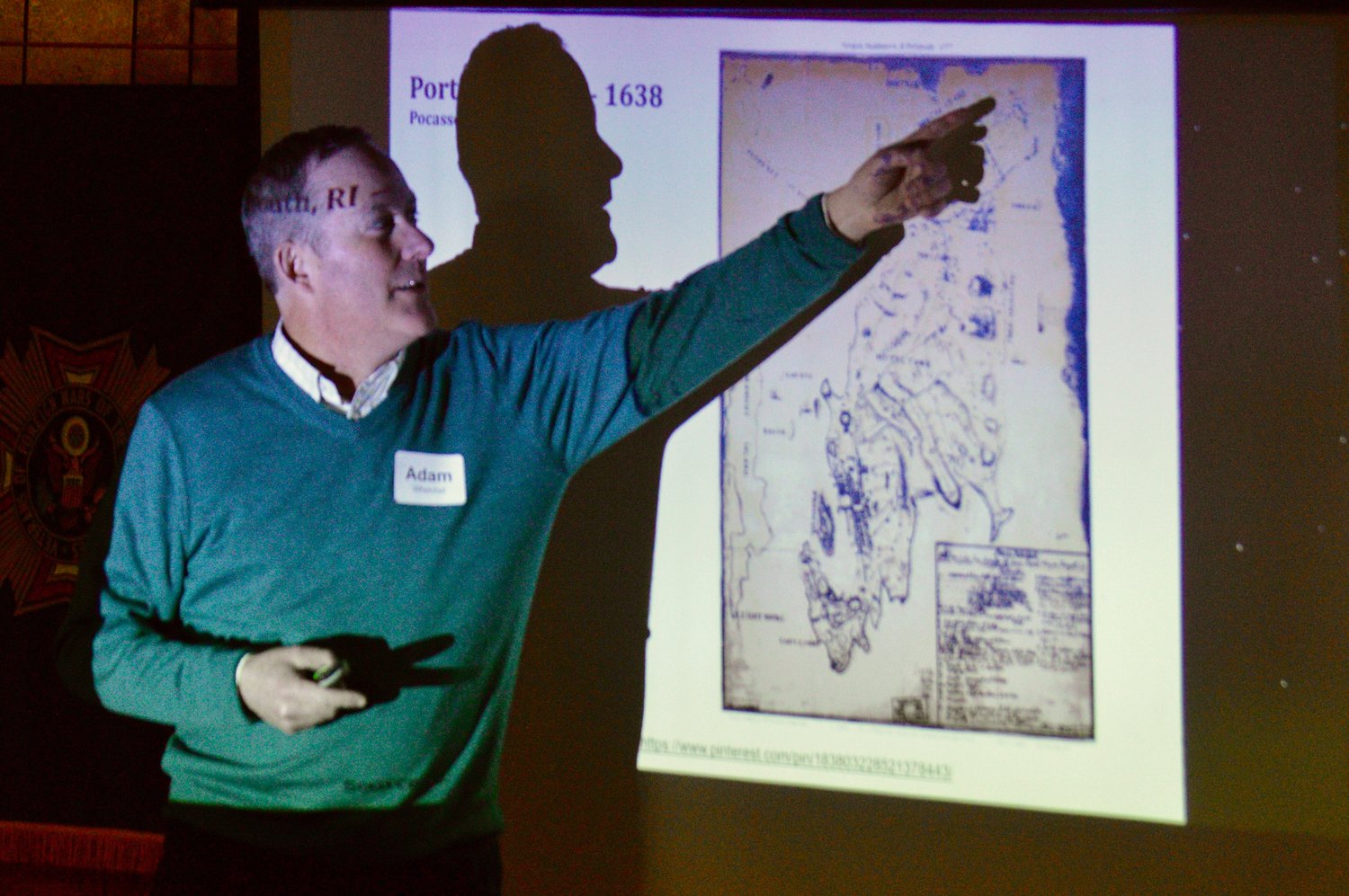 Adam Whelchel, director of science at The Nature Conservancy in Connecticut, points to a map of the town during the first day of the workshop on April 6.