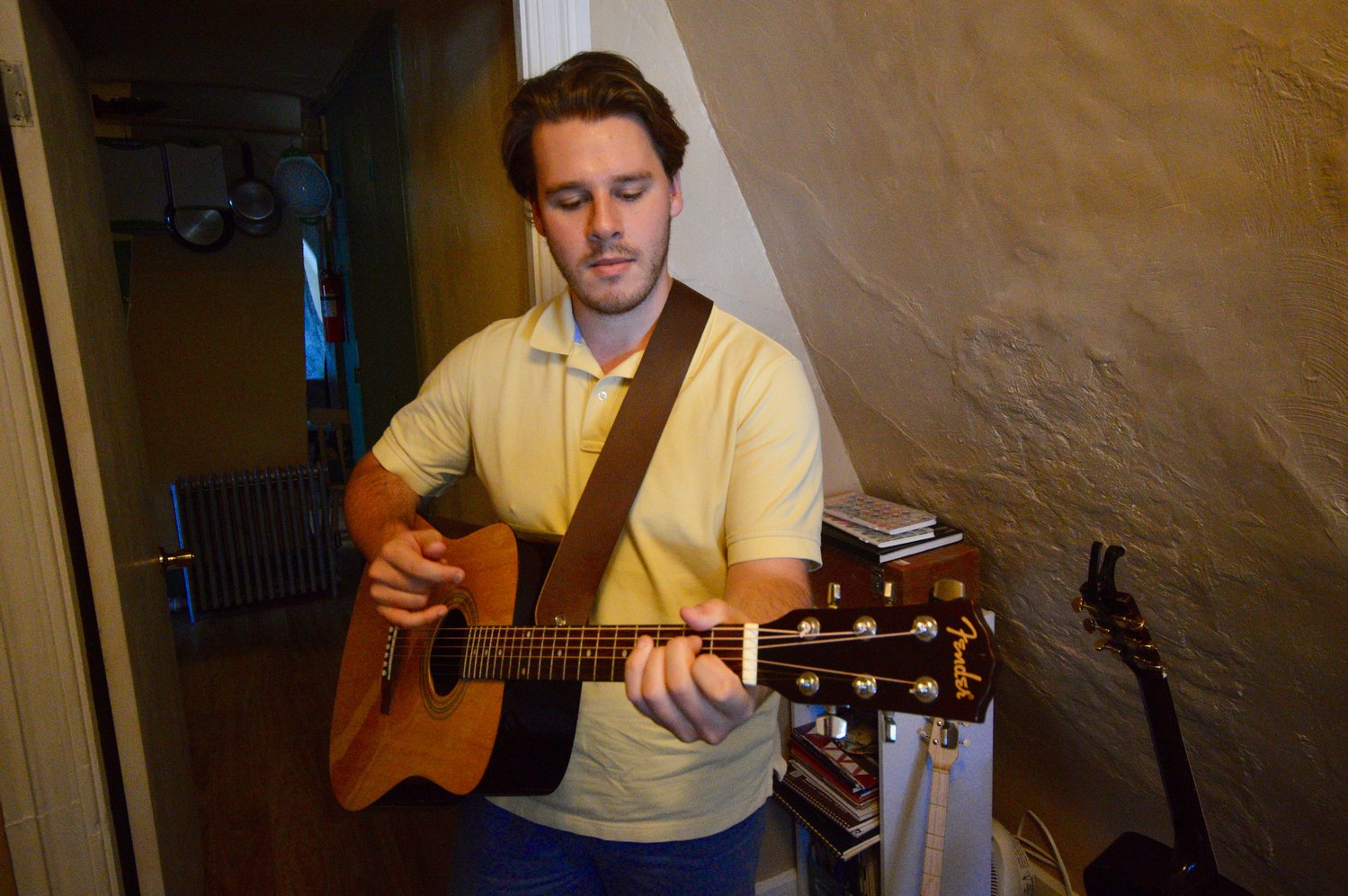 Nicholas Quigley plays acoustic guitar in his apartment’s tiny music studio that’s crammed with other instruments. He used guitar as a counterpoint to nature sounds he heard during a walk at Gooseberry Island in Massachusetts.