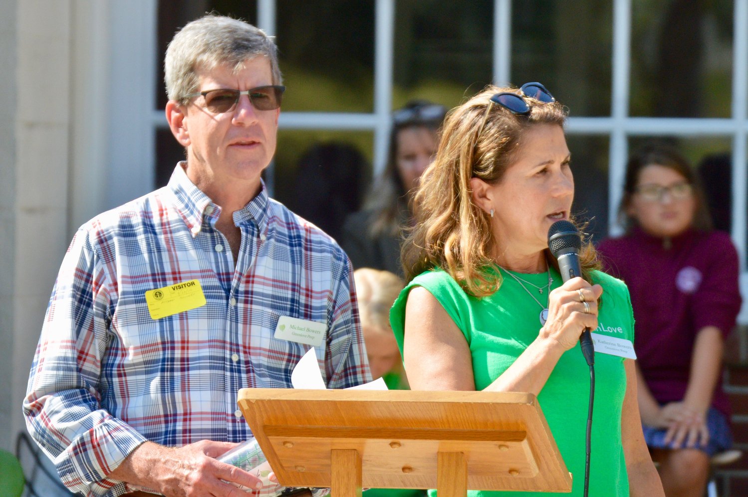 Michael and Katherine Bowers explain the mission of the Greenlove Foundation to students.