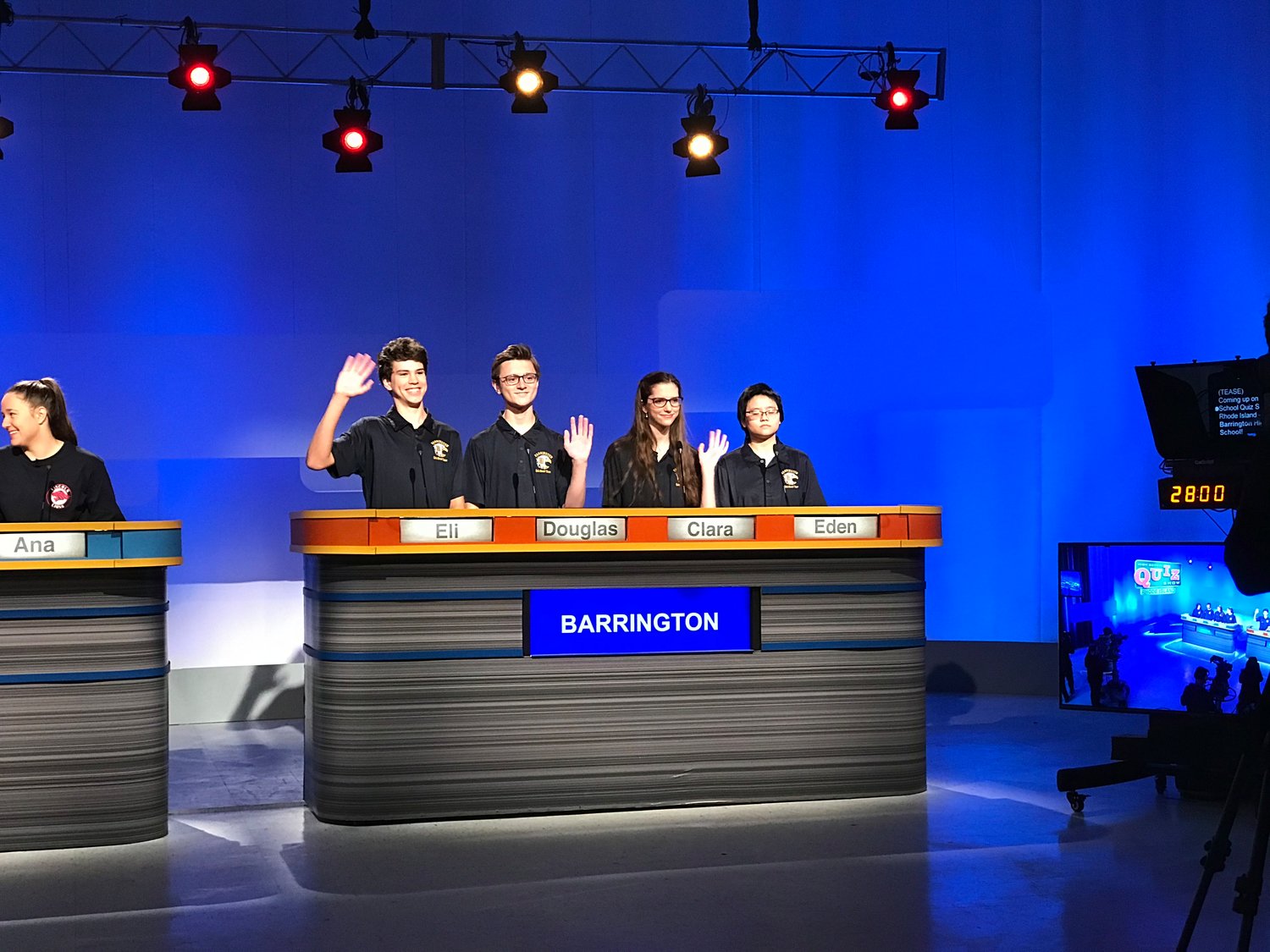 BHS team members Eli Terrell, Douglas Meeker, Clara Kugler and Eden Lamb (from left to right) wave during the taping of the third annual High School Quiz Show Rhode Island.
