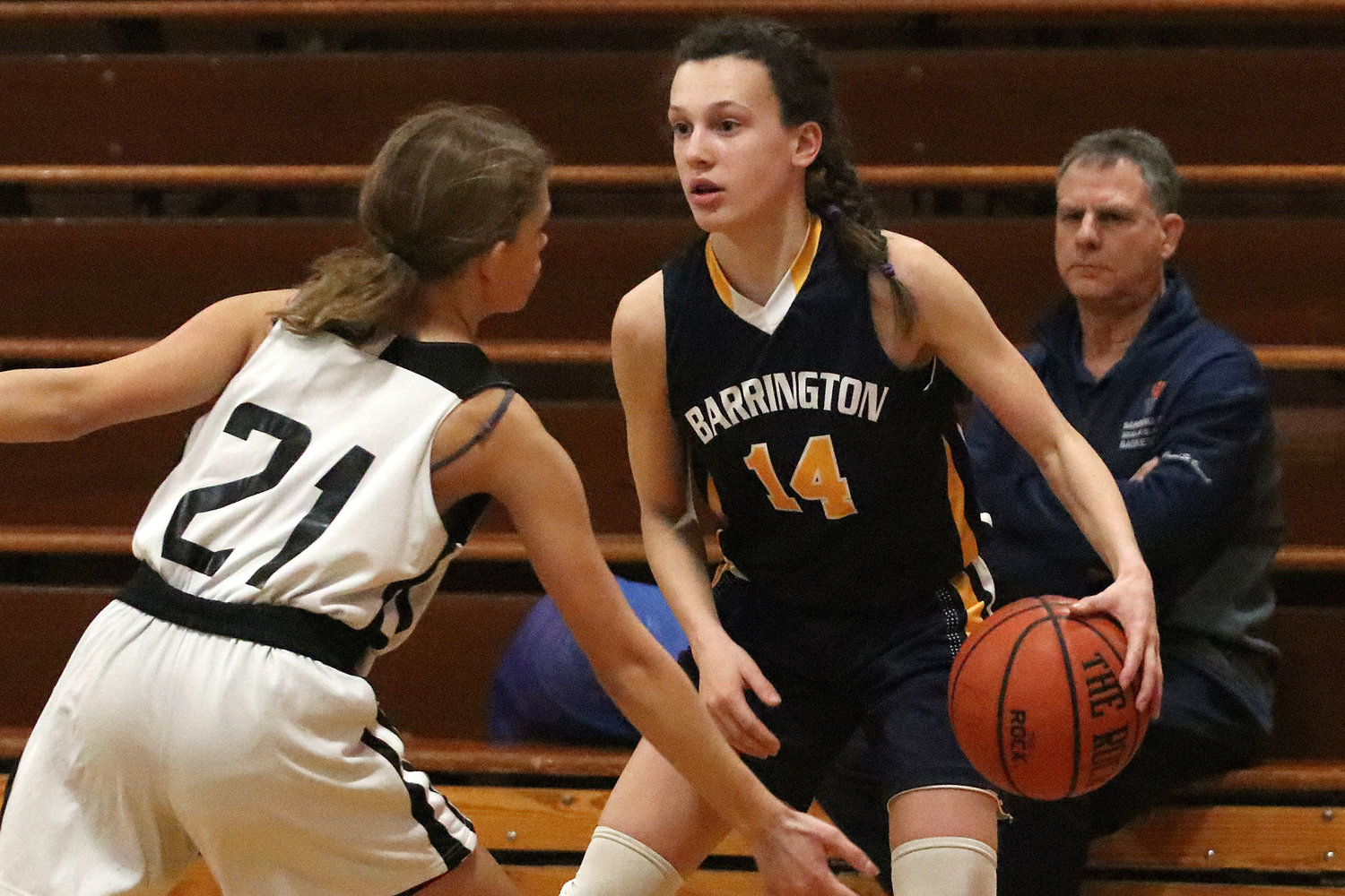 Barrington's Maddie Gill looks for an opening in the Kickemuit Middle School defense during a game last week. Maddie and the BMS girls team finished the regular season undefeated.