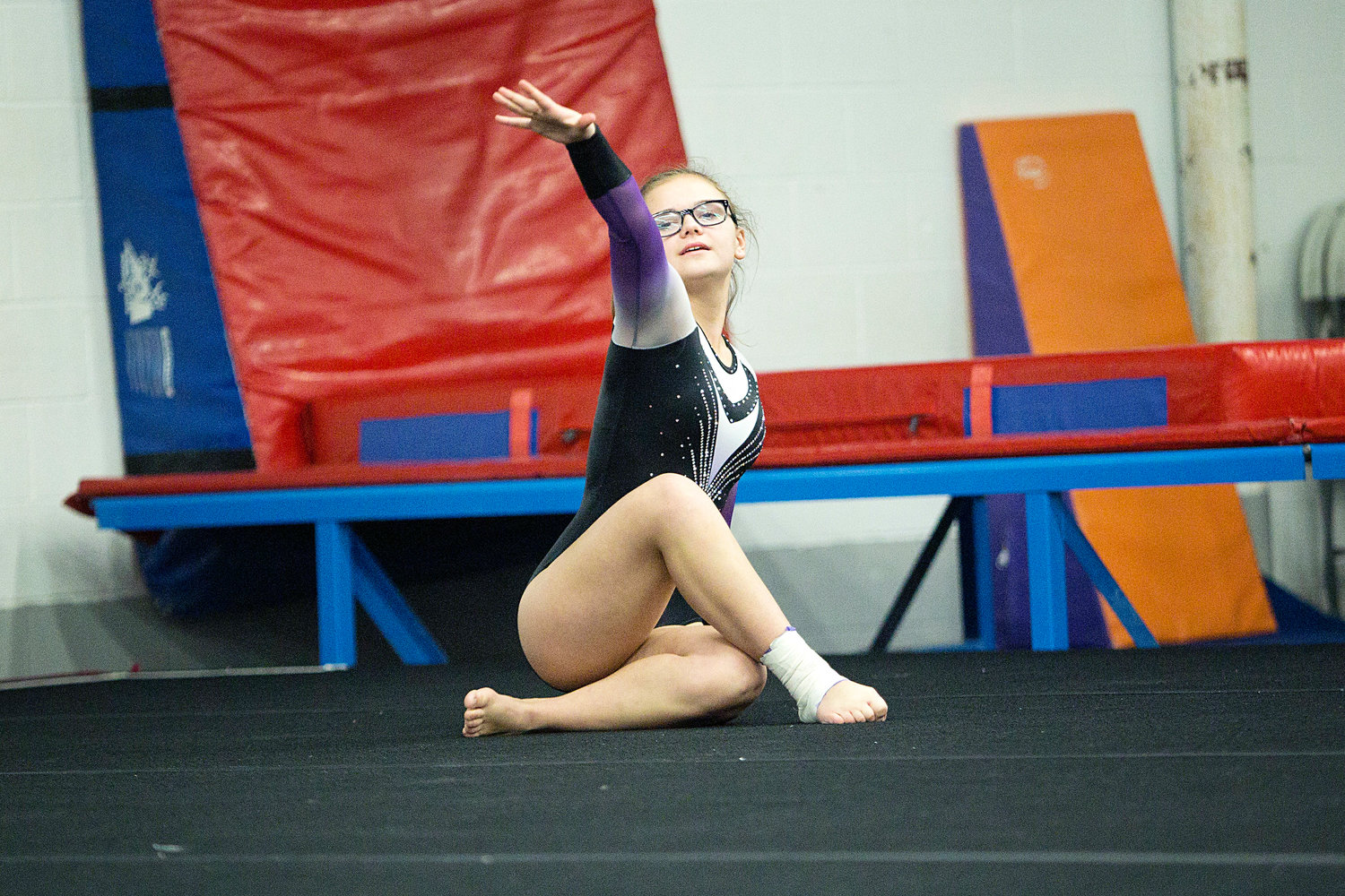 Marissa Grenier completes her floor exercise during a home meet
against South Kingston, Tuesday, January 21st.