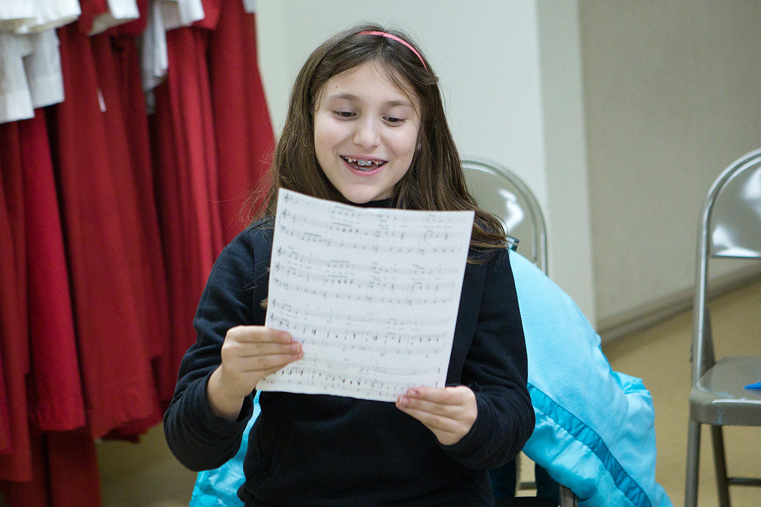 Sophia Kosinski of Portsmouth braves a few solo bars while practicing with the Newport County Youth Choir.