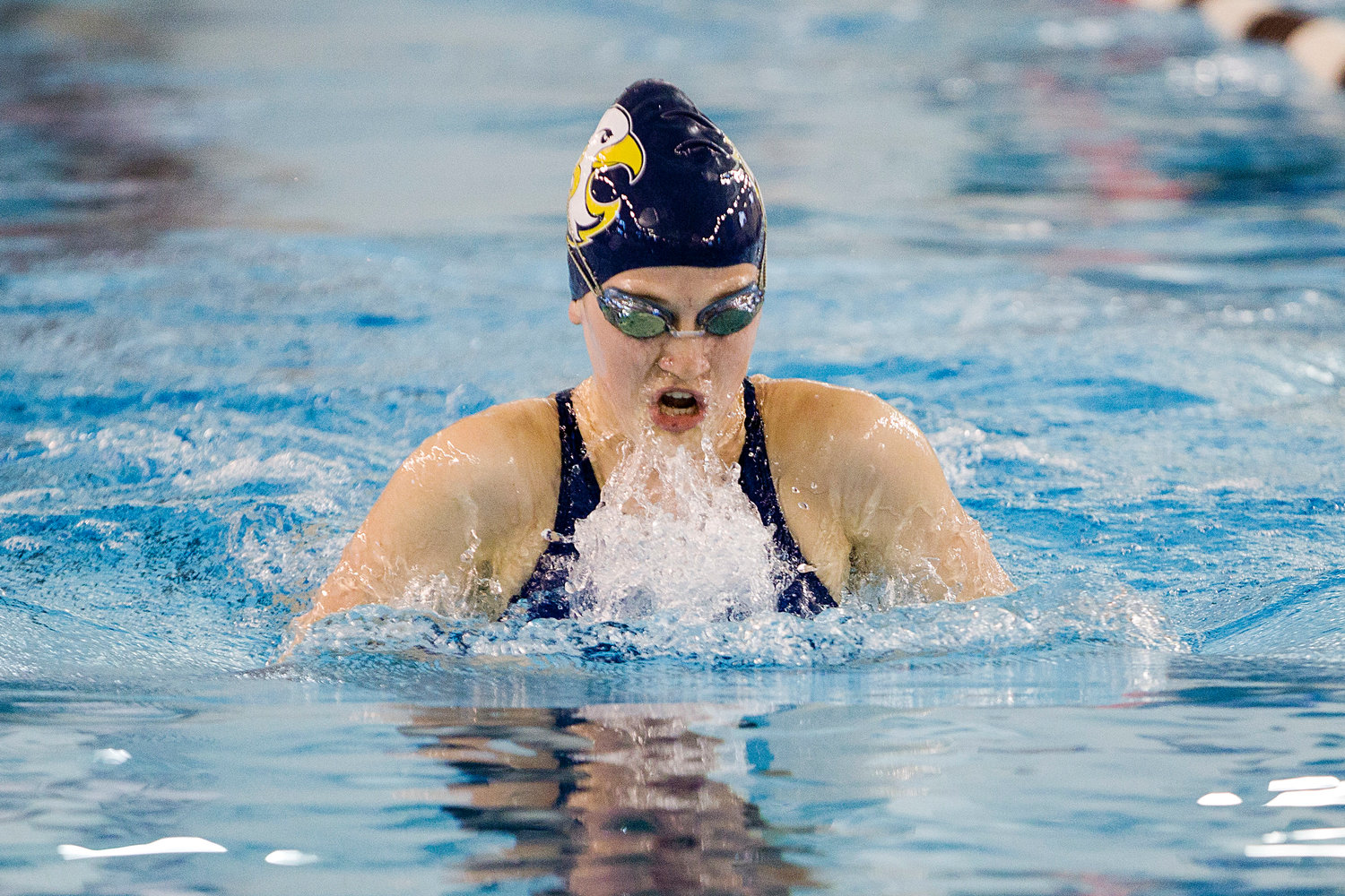 Ellie Wind competes in the 100 breaststroke event, at the state championship meet, Saturday.