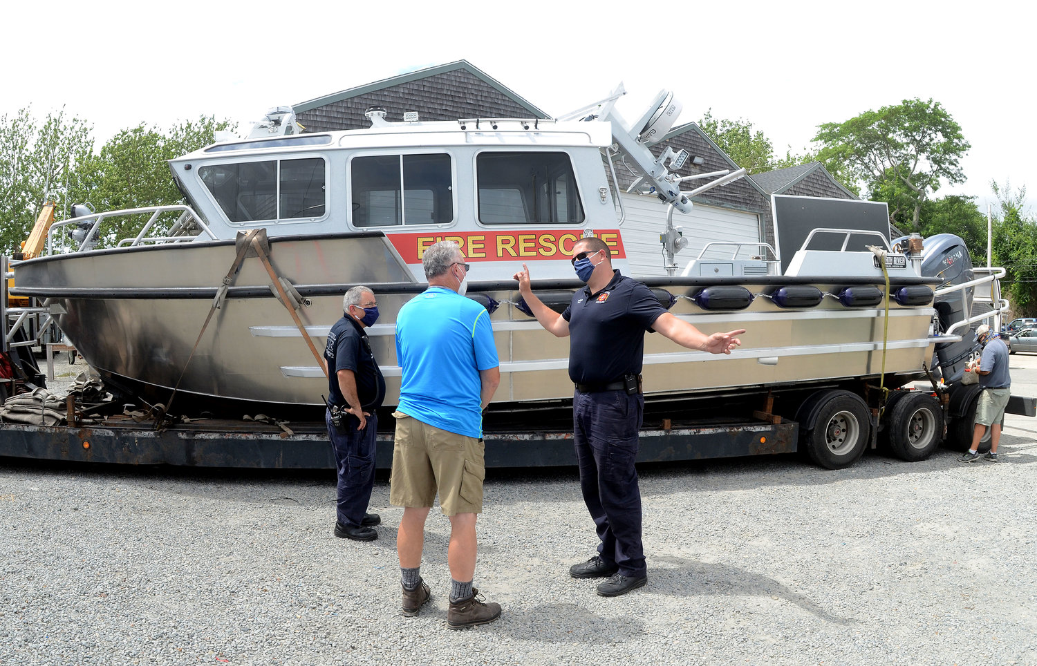Bristol Fire Chief Michael DeMello talks about the new boat prior to its launching last week.