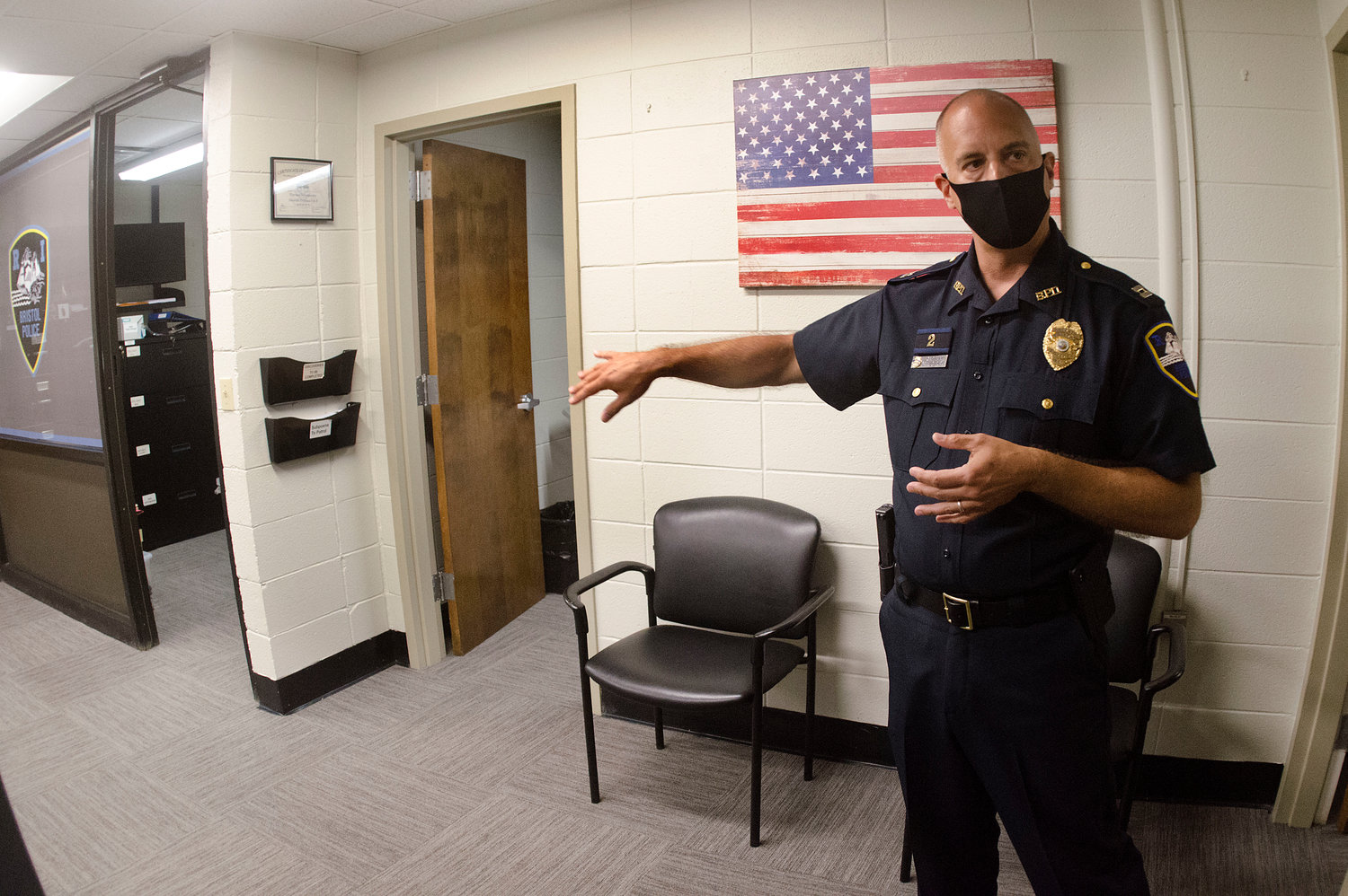 Capt. Brian Burke shows some of the building improvements, including new carpeting, all done in-house by officers.