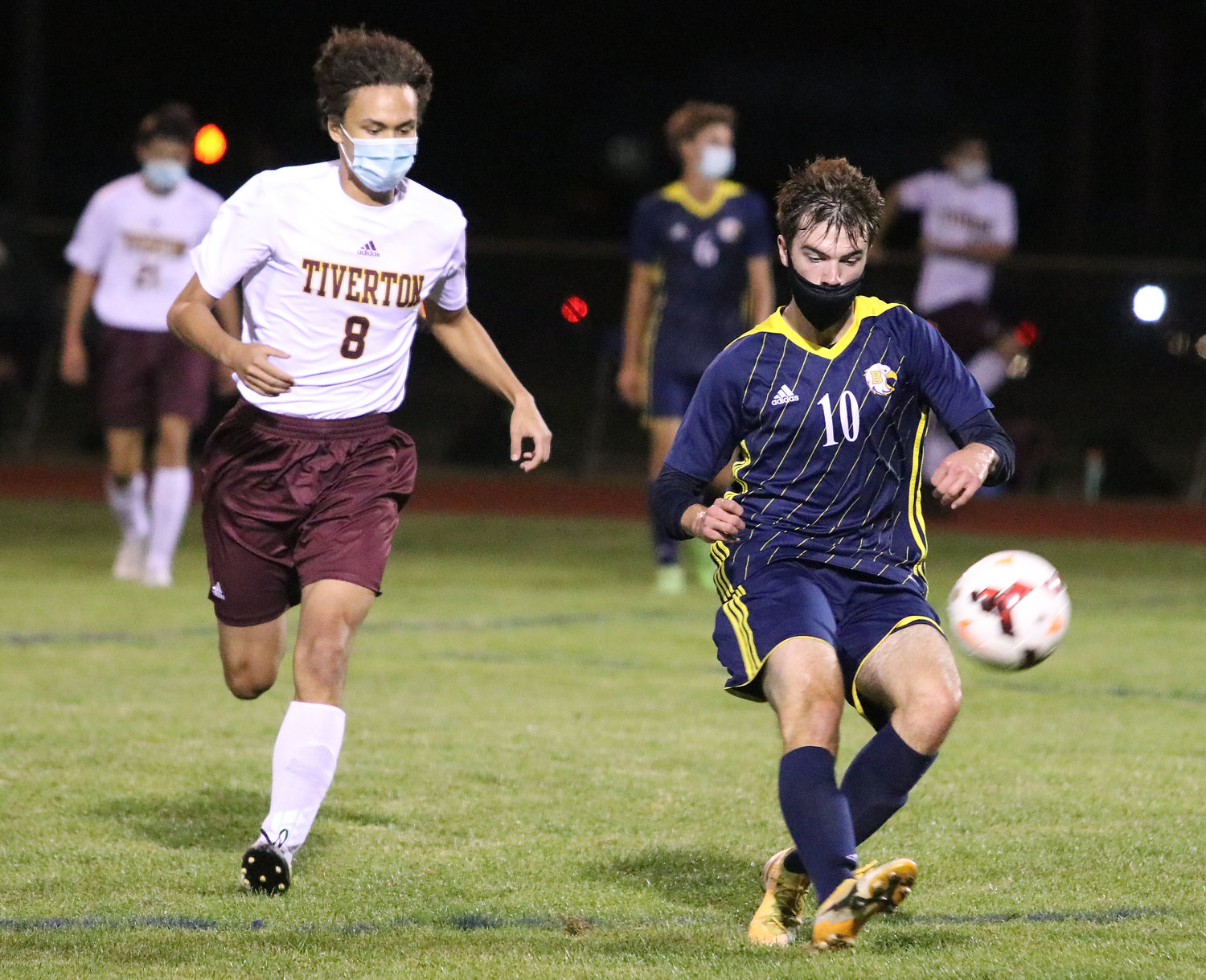 Barrington High School's Nick Rockwell passes the ball during the Eagles 0-0 tie against Tiverton.