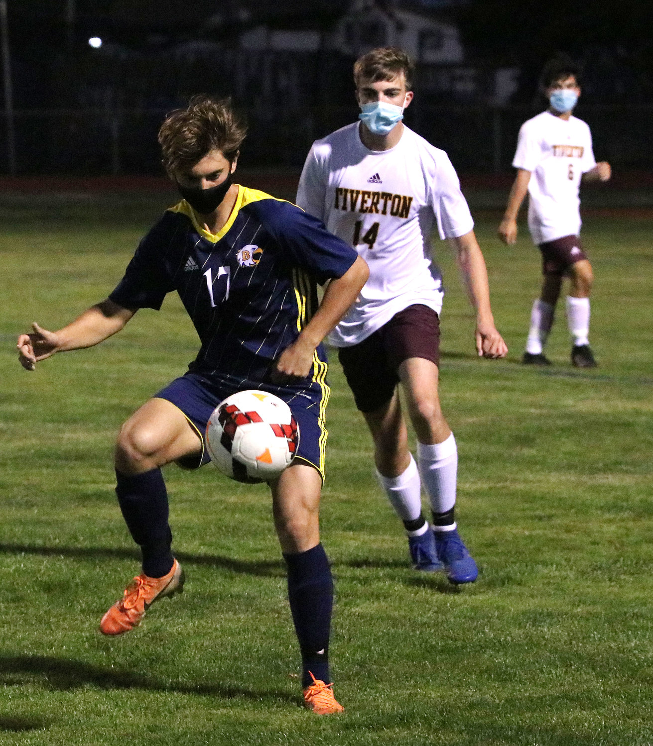 Barrington High School's Nick Rockwell controls the ball while a Tiverton player moves in. The Eagles tied the Tigers 0-0 in the non-league game.