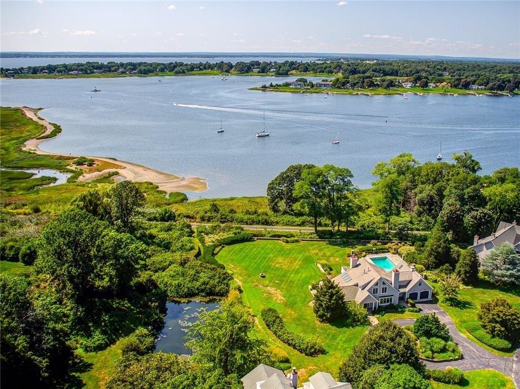 Aerial photography puts this Warren condominium in a new light. Currently on the market with Residential Properties, it is shown tucked in a private setting near the East Bay Bike Path and Narragansett Bay.