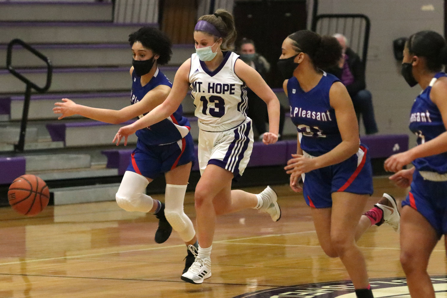 Point guard Abby Razzino dribbles up court after making a steal in the first quarter of their game against Mt. Pleasant on Thursday night. The sophomore scored 17 points in the victory.