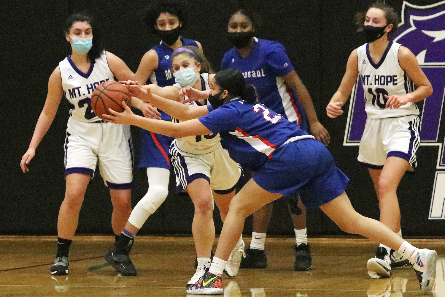 Point guard Abby Razzino pokes away a Mt. Pleasant pass, eventually stealing the ball.