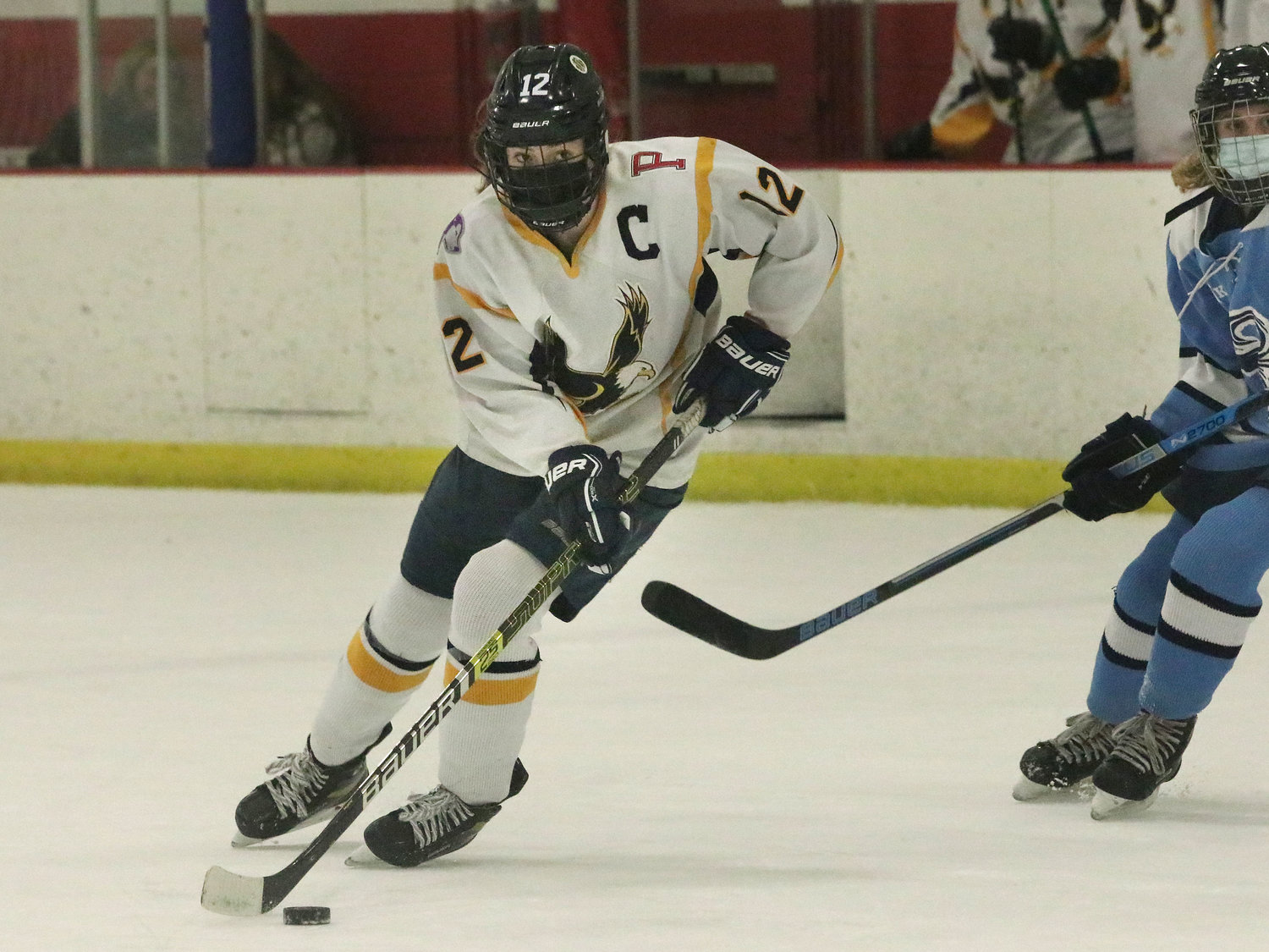 Kat Barker skates with the puck, into the Narragansett zone in Game 2.