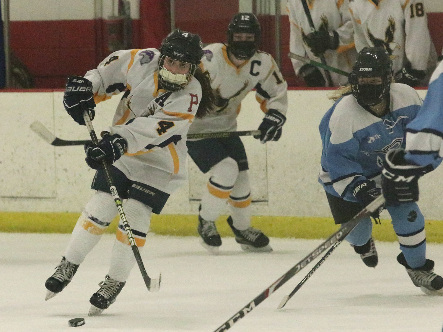 Marissa Levreault makes a pass to line mate Kat Barker who went on to score in the second period in Game 2.