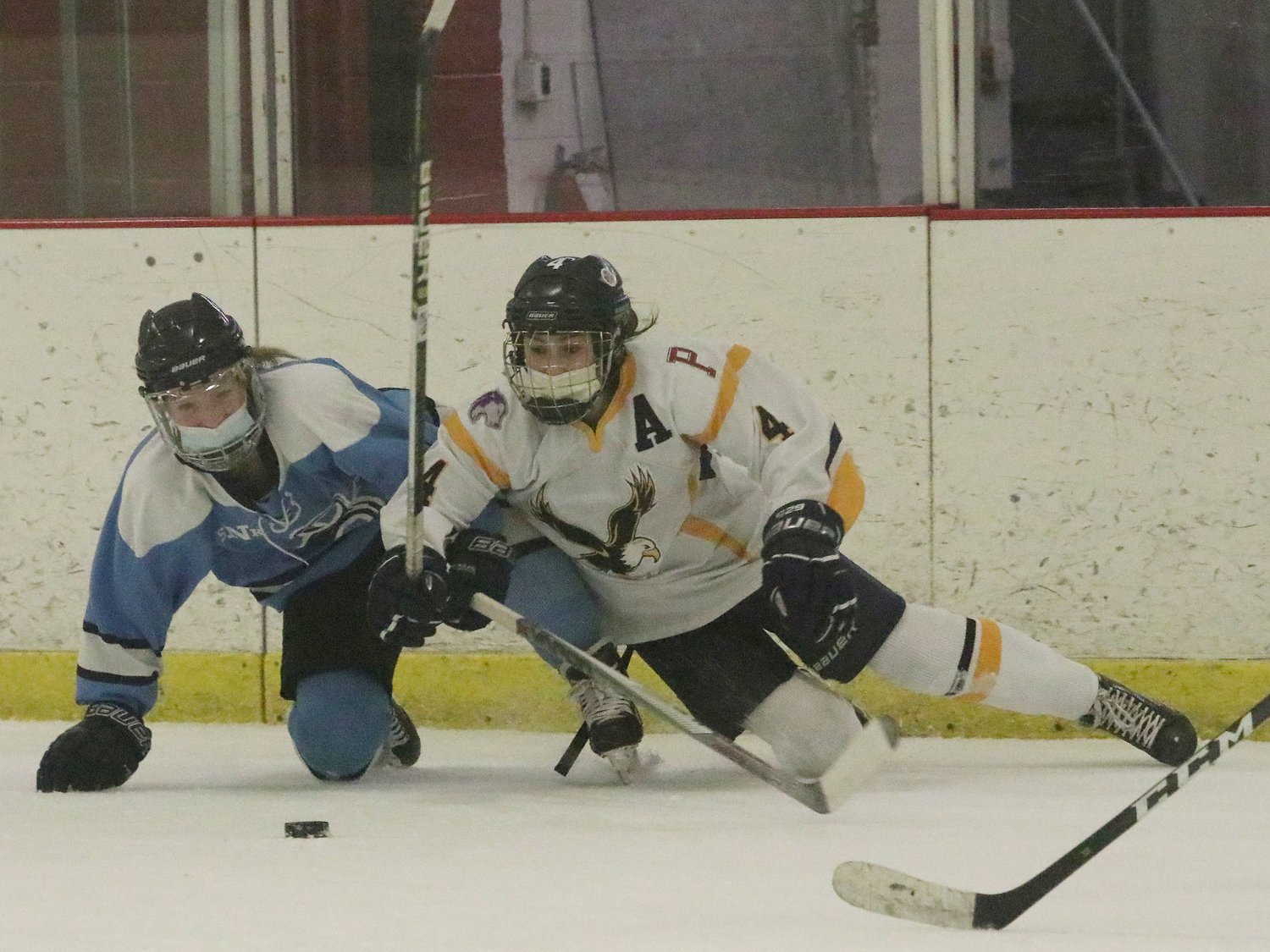 Marissa Levreault gets taken down while breaking up ice in Game 2.