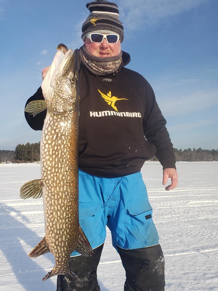 Big pike:  Capt. BJ Silvia of Flippin-Out Charters (Portsmouth) with fishing partner Greg Vespe (Tiverton) and friends had a pick-up ice fishing tournament this weekend at Lakeside Lodge & Marine, Winthrop, Maine.  "The fishing was outstanding." said Capt. Silvia. 