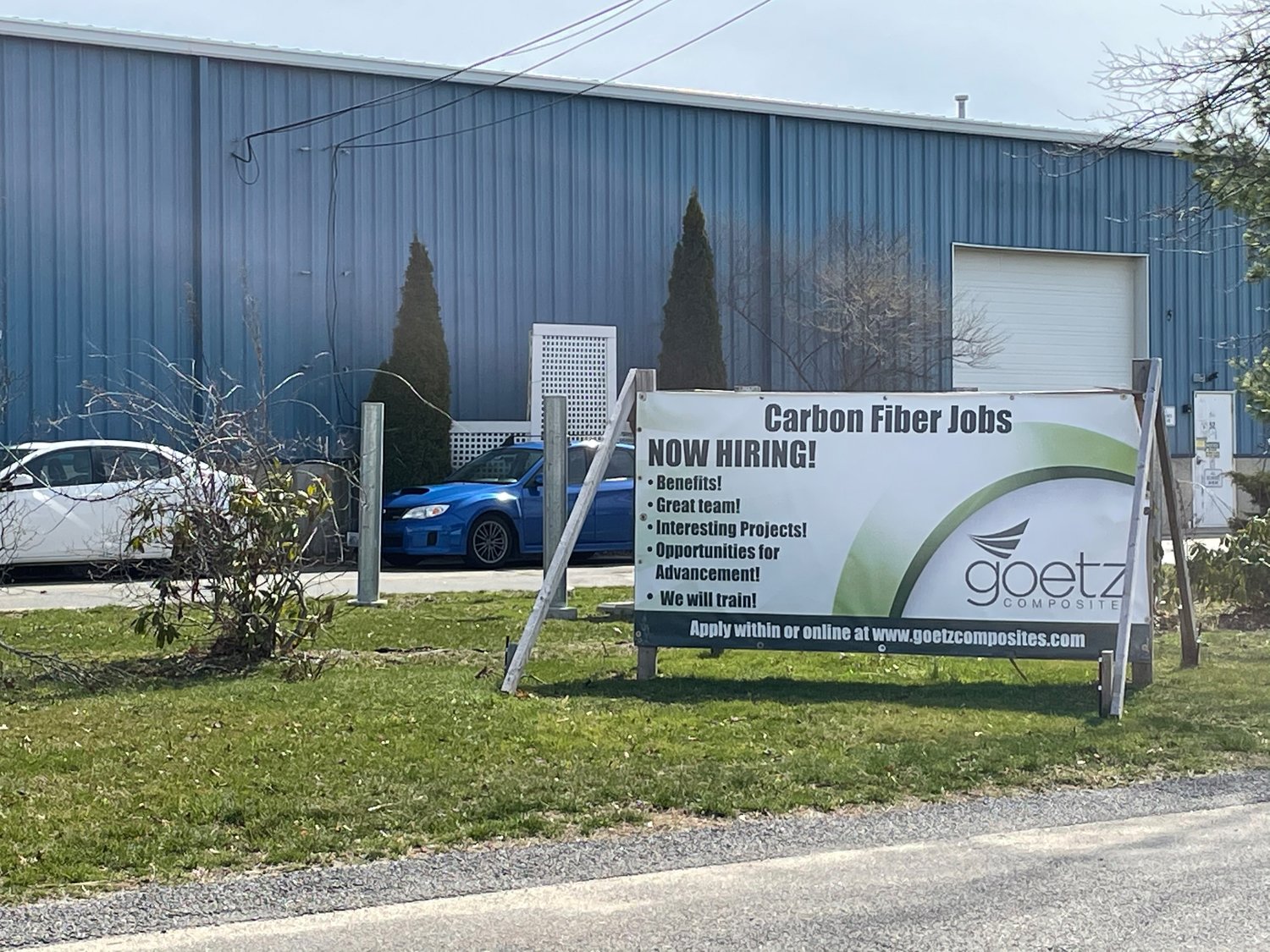 A sign in front of Goetz Composites speaks to its anticipated growth. Goetz is using temporary construction trailers to house the majority of its office and administrative teams. Its $1.3 million expansion will create new office space and free up a lot of manufacturing space.