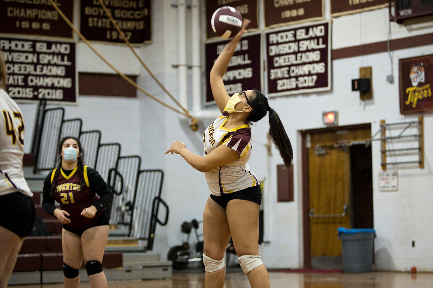 Olivia Miranda spikes the ball over the net during Tuesday night's
game against Paul Cuffee School.
