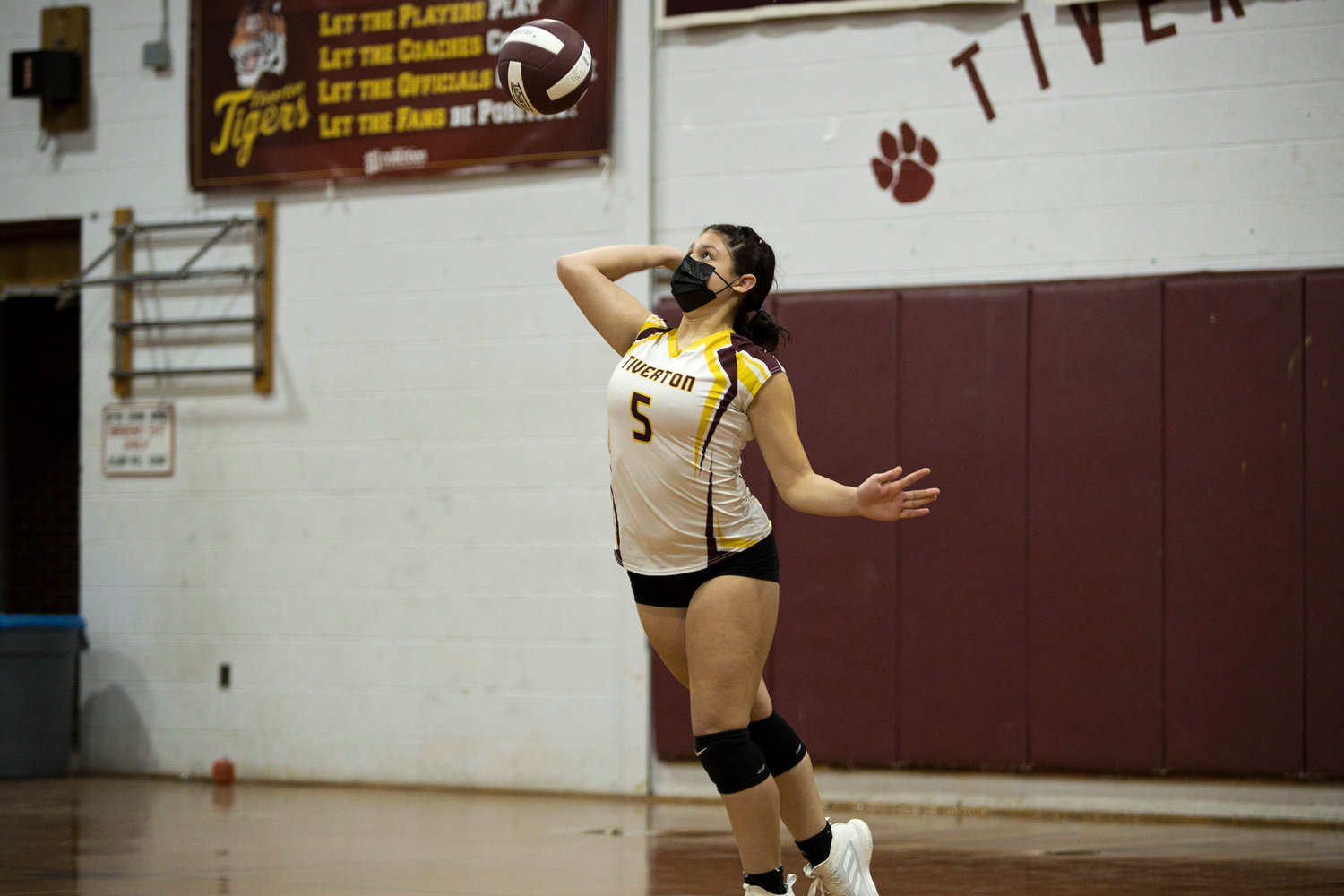 Gabby Torres serves the ball to Paul Cuffee School during Tuesday
night's game.